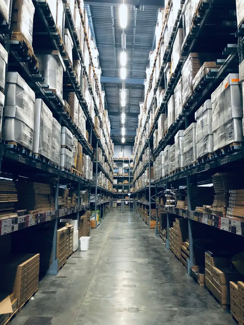Long warehouse aisle with pallet racking